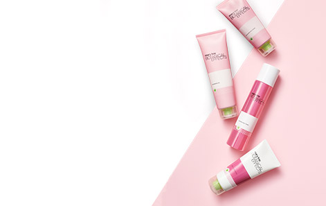 Mary Kay Botanical Effects® products styled against a pink and white background.