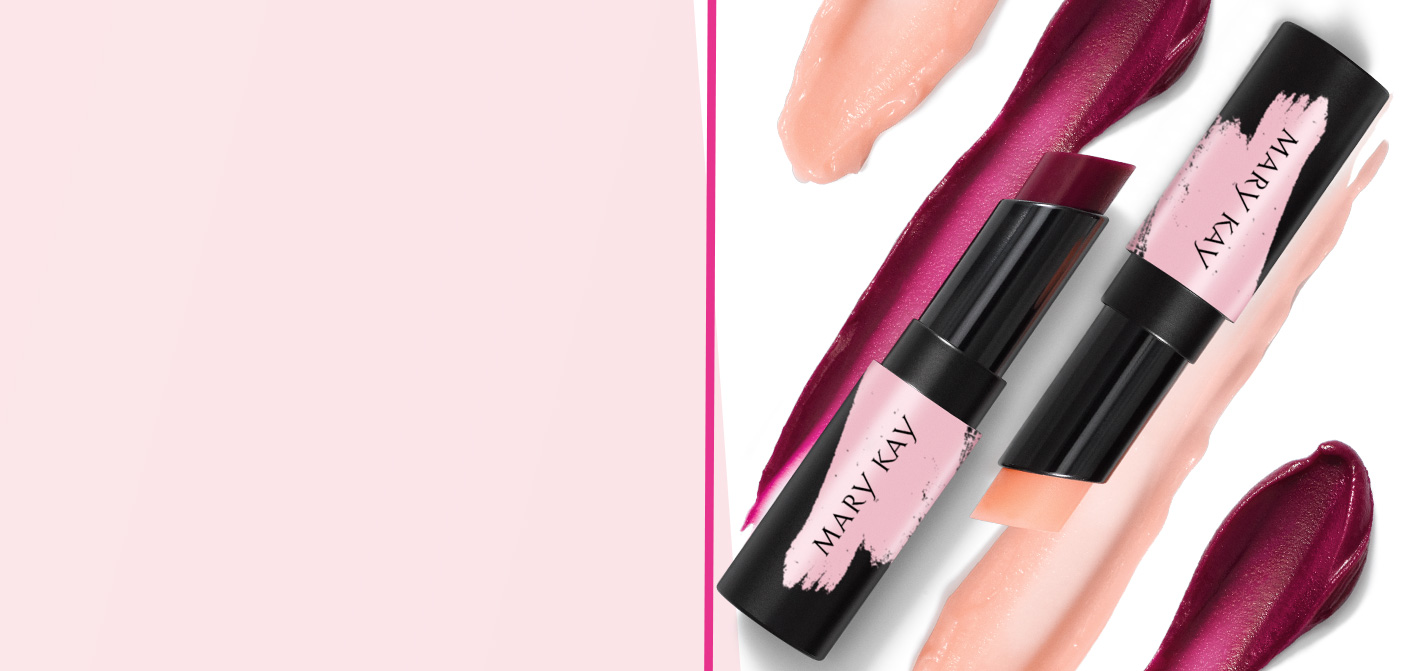 Open tubes of limited-edition Mary Kay® Intuitive pH Lip Balm in Berry and Pink on top of product rubs