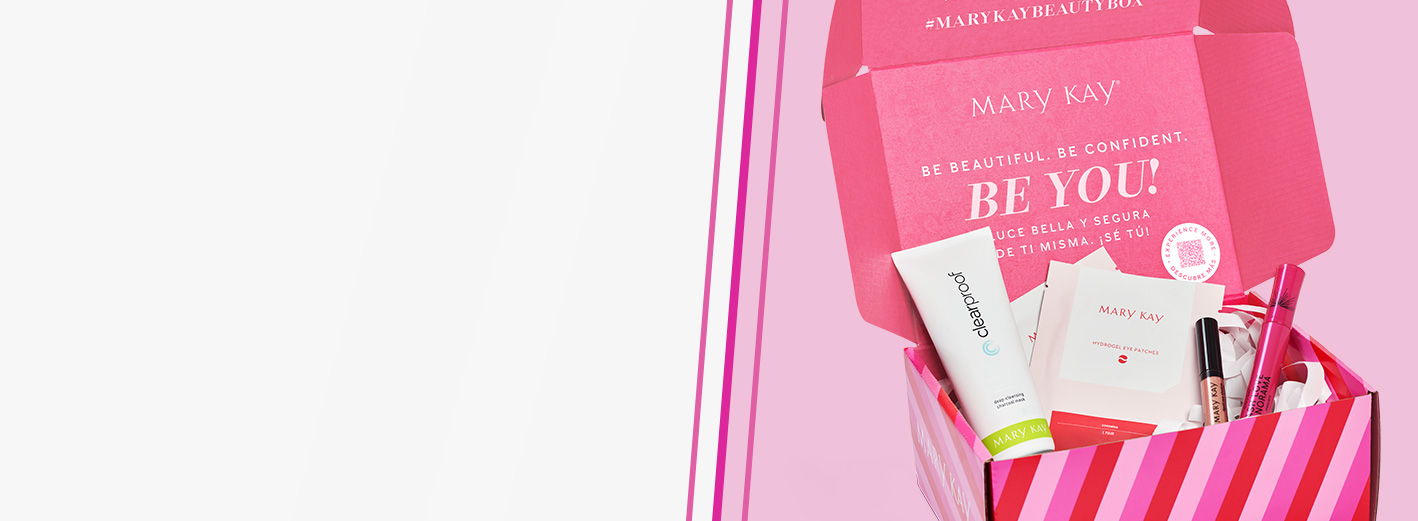 Limited-Edition Mary Kay® Beauty Box set against a pink background with the lid open and assorted products styled inside
