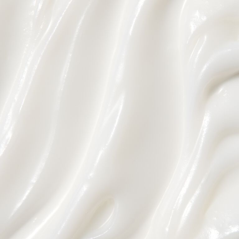 Close-up of white cleansing balm smear
