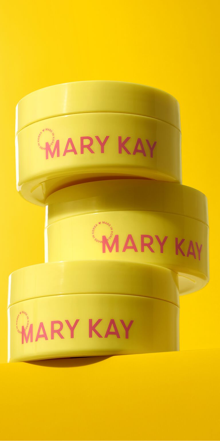 Stack of three yellow jars of Mary Kay Snail Gel Face Patches