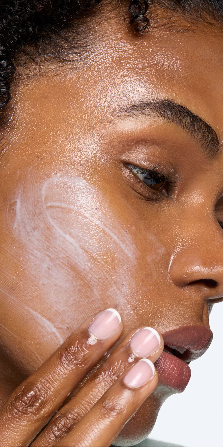 Close-up of woman with Mary Kay Melt-In Cleansing Balm on face