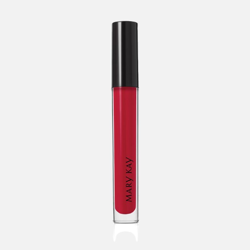 Closed tube of Mary Kay Unlimited Lip Gloss in shade Iconic Red standing against a white background.