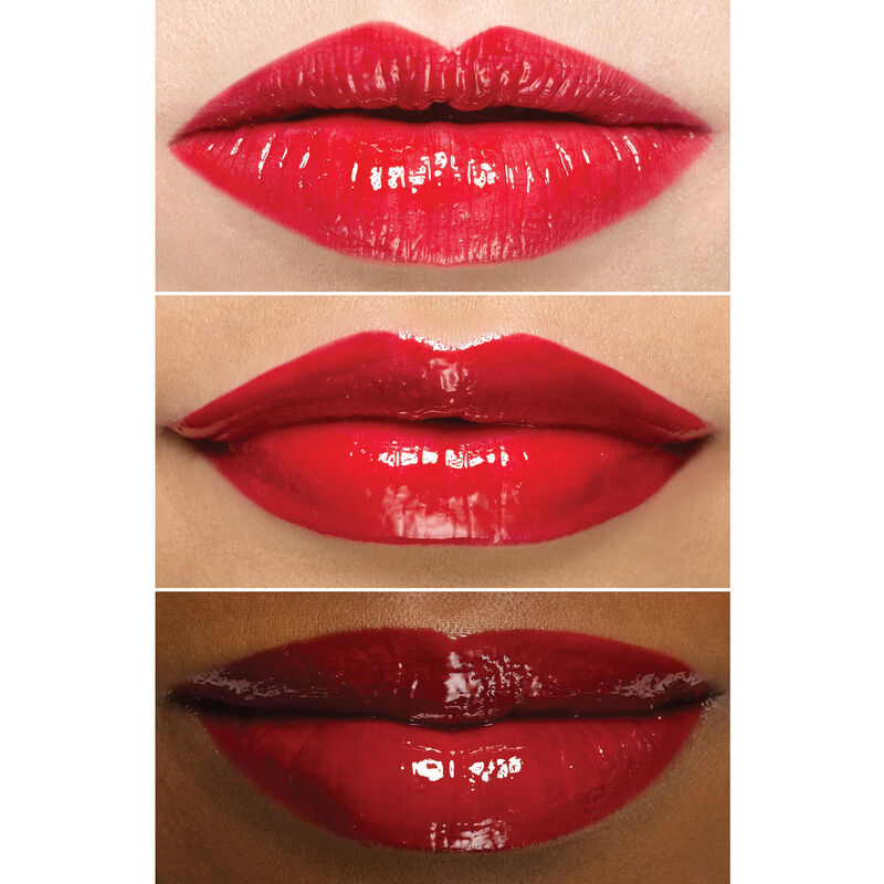 Close up of lips wearing Mary Kay Unlimited Lip Gloss in shade Iconic Red on an ivory, bronze and deep skin tone.