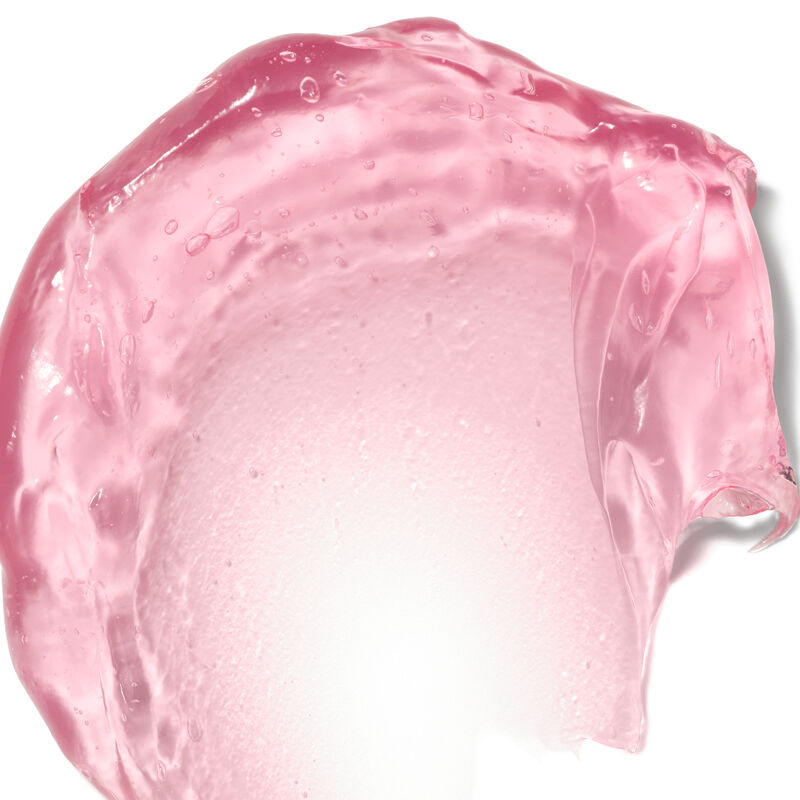 Primer plano de una muestra de gel hidratante con col&aacute;geno de color rosa