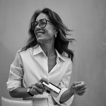 Two smiling women.