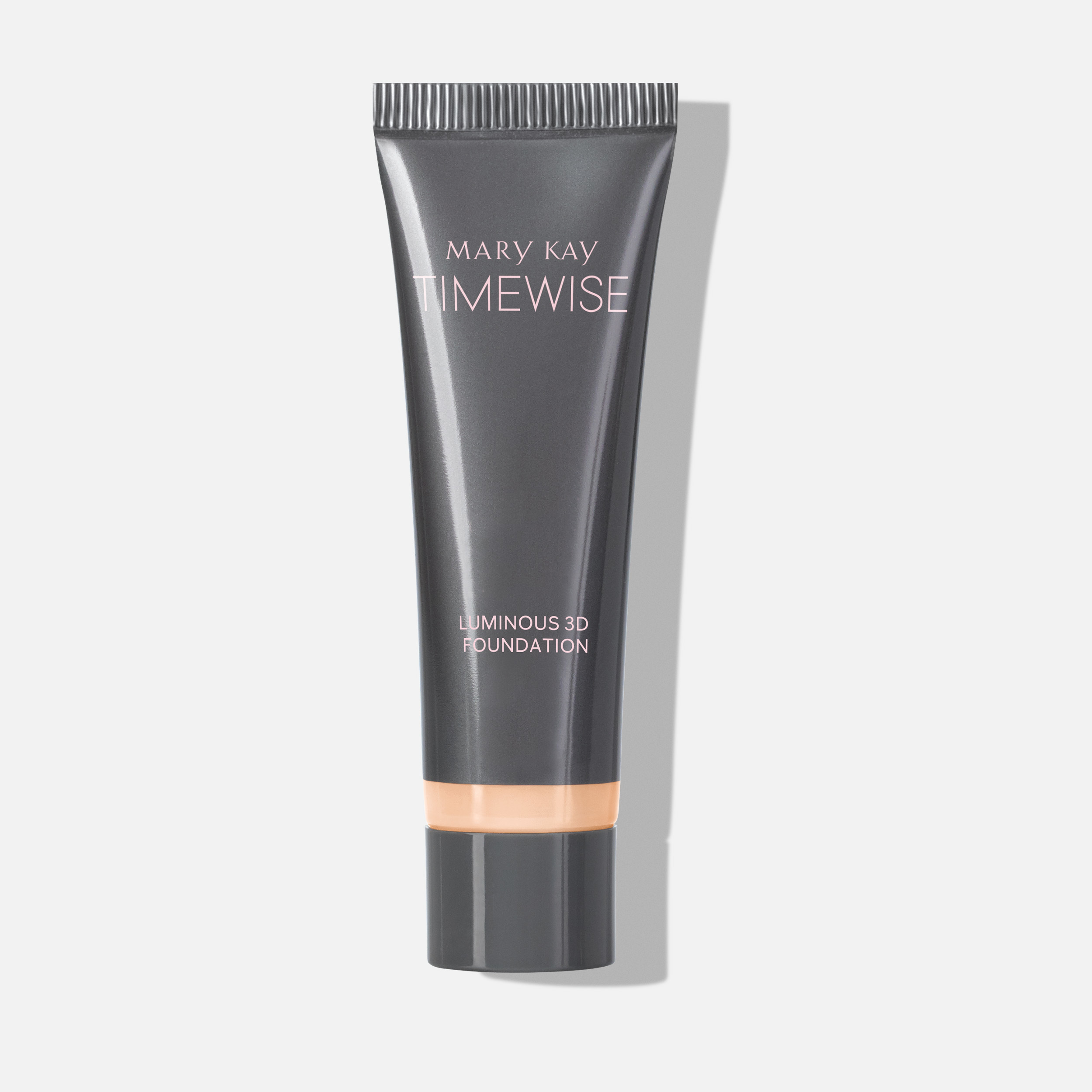 Tube of TimeWise Luminous 3D Foundation in the shade Ivory C 100 standing on its cap.