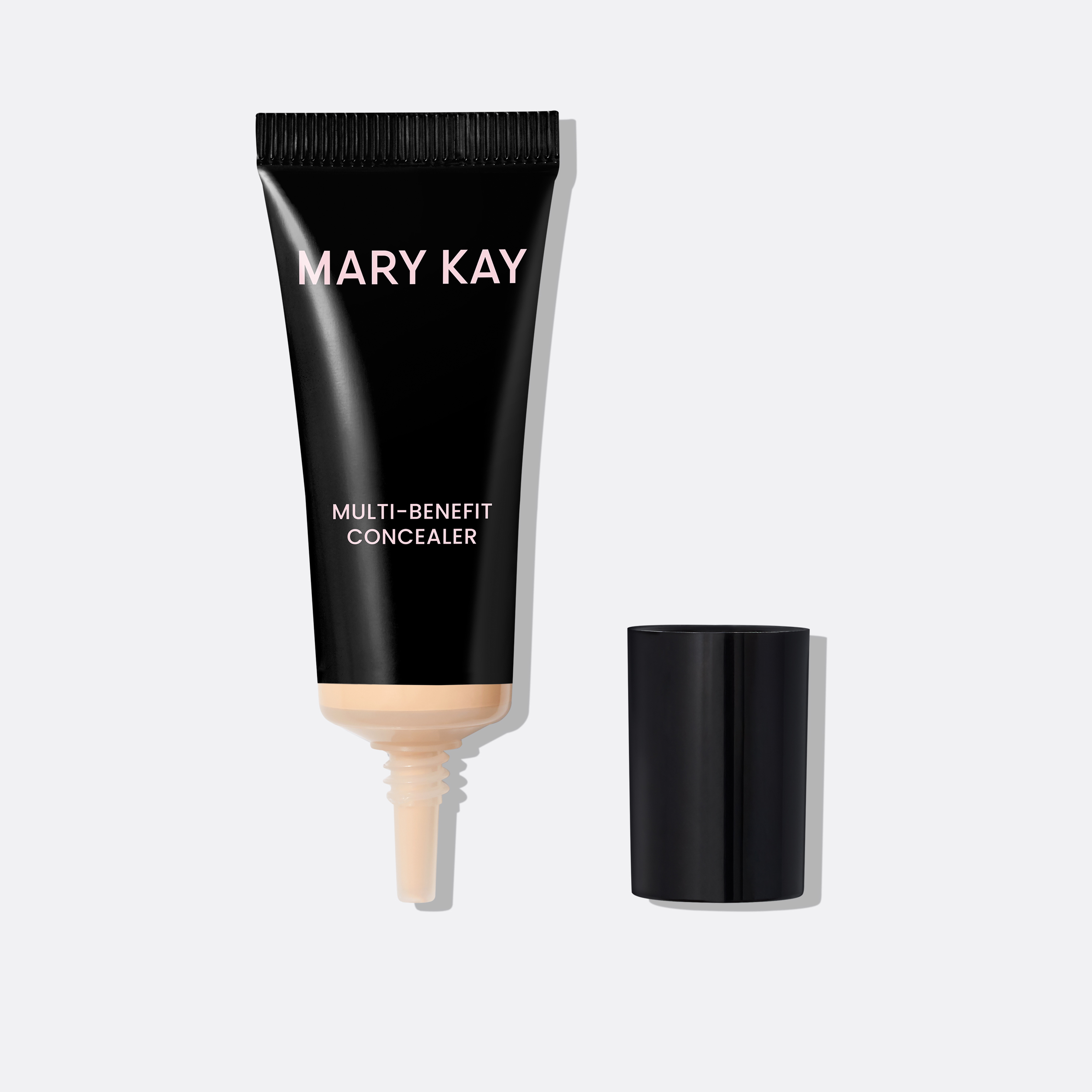 Black Mary Kay Multi-Benefit Concealer Tube in Light 1 with the cap removed, showcasing the needle nose